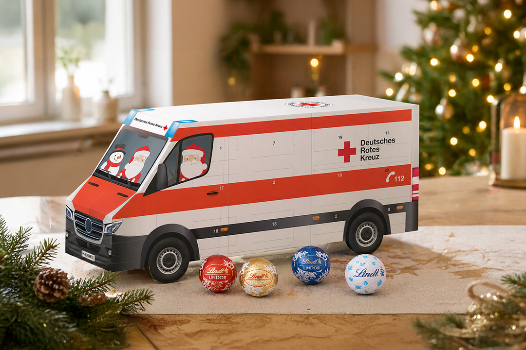 Weihnachtsmodell, Rettungswagen, Spielzeugfahrzeug, Adventsschmuck, Lindor Pralinen
